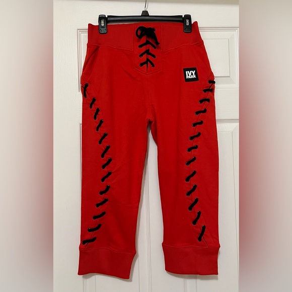IVY PARK Pants - Ivy Park Red Lace-Up Cropped Sweatpants
